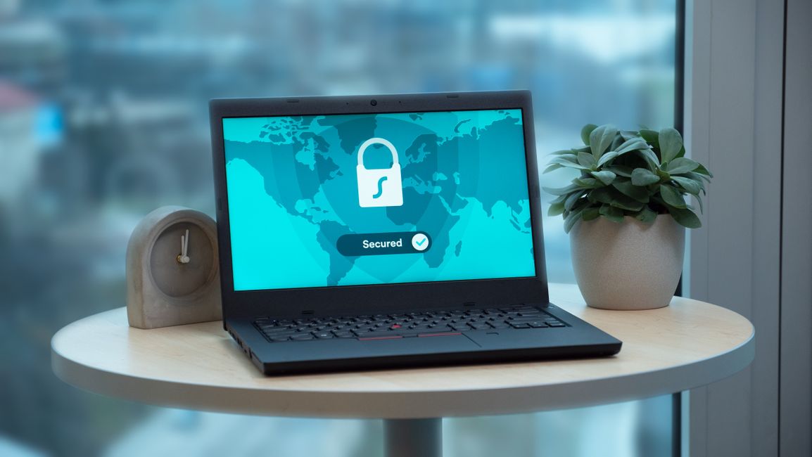 Usenet Privacy and SSL Laptop screen showing a padlock icon and a secured connection