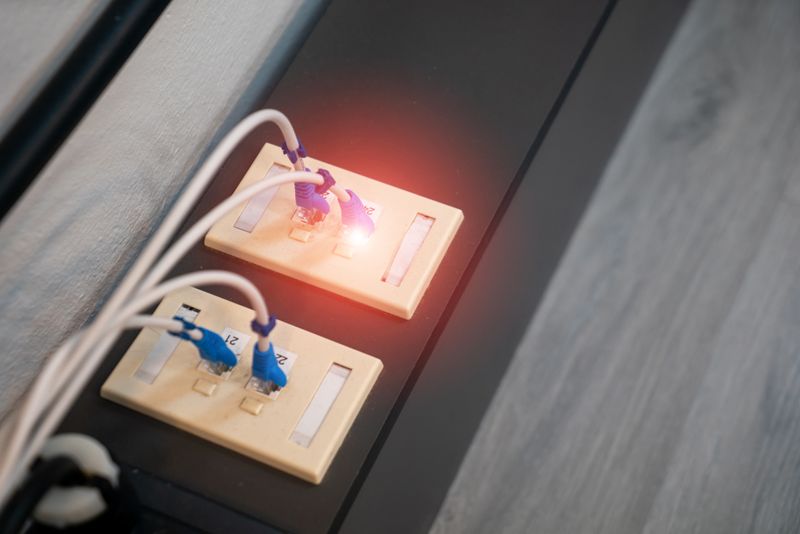 Ethernet cables in wall jacks, a wired connection for better Usenet download speed